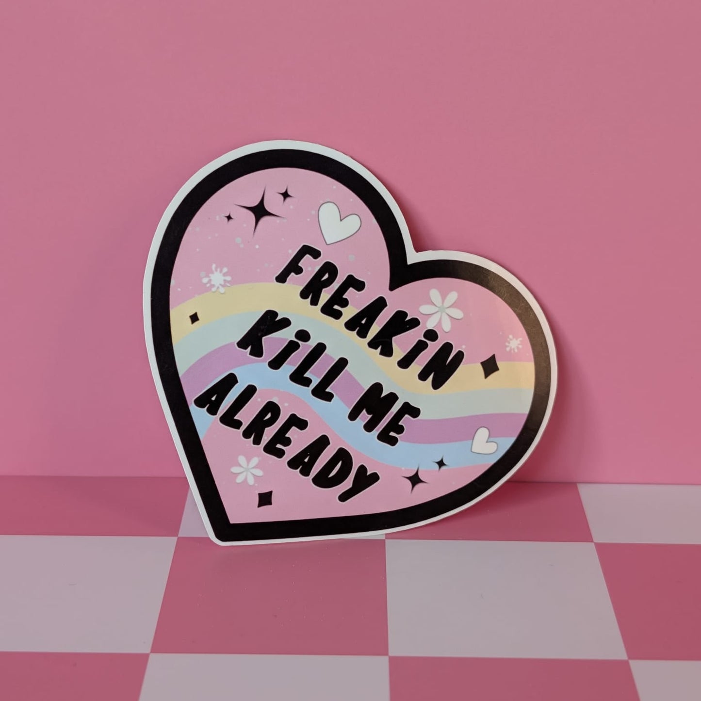 Heart-shaped sticker with text 'Freakin Kill Me Already' on a pink background