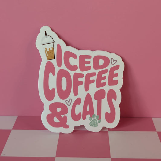 Sticker with 'ICED COFFEE & CATS' text on a pink background