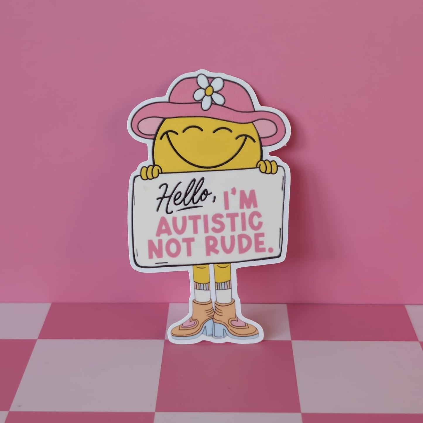 Cartoon character holding a sign on a pink and white checkered floor.