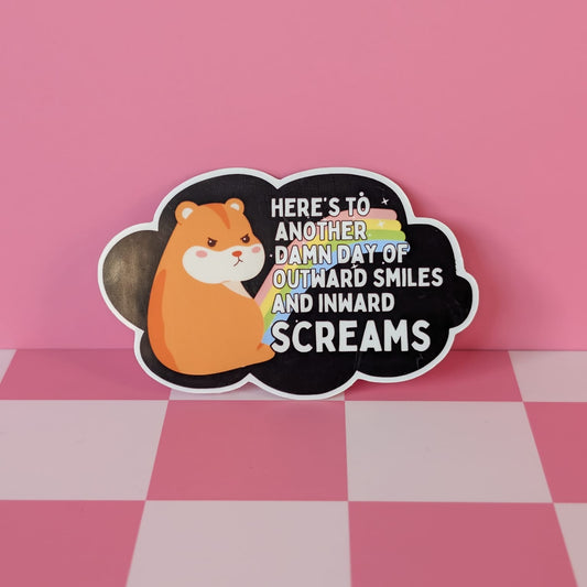 Sticker with a cartoon hamster and humorous text on a pink checkered background