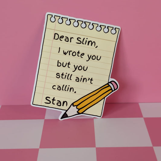 Note with text 'Dear Slim, I wrote you but you still ain't callin. Stan' on a pink checkered background
