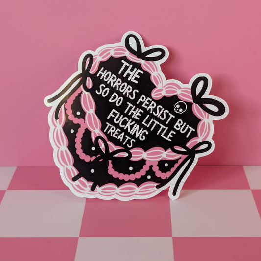 Sticker with text and lace design on a pink background