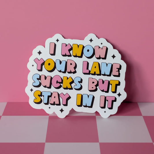 Colorful sticker with text on a pink checkered background