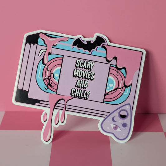 Sticker with 'Scary Movies and Chilla' text on a pink background